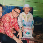 Pj Bupati Banyuasin Salurkan Bantuan Cadangan Pangan Pemerintah Tahun 2025 Banyuasin_Bantuan Cadangan Pangan